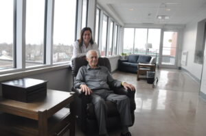Cancer patient and caregiver in new sunroom